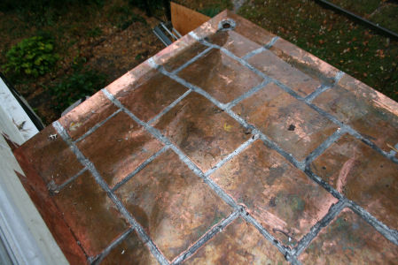 roof cement destroys copper