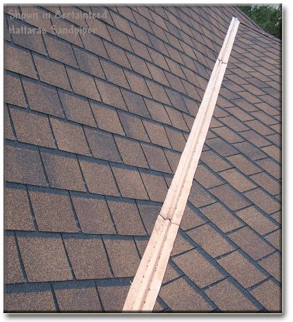 asphalt shingle roof with metal valley